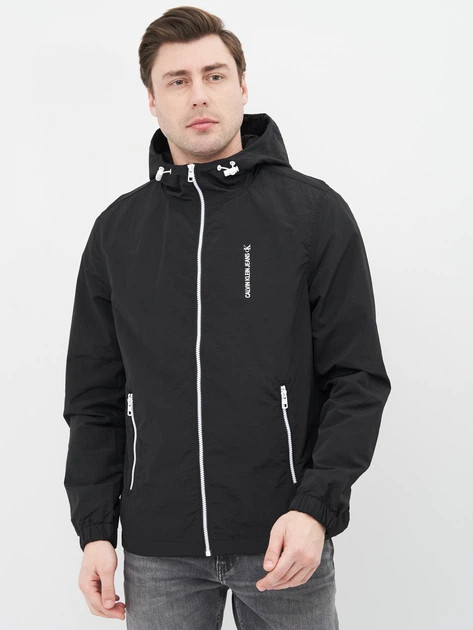 کاپشن سبک و کلاهدار مردانه Calvin Klein Jeans مشکی – لوگو چاپی پشت