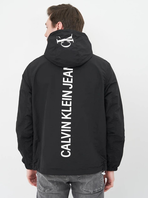 کاپشن سبک و کلاهدار مردانه Calvin Klein Jeans مشکی – لوگو چاپی پشت